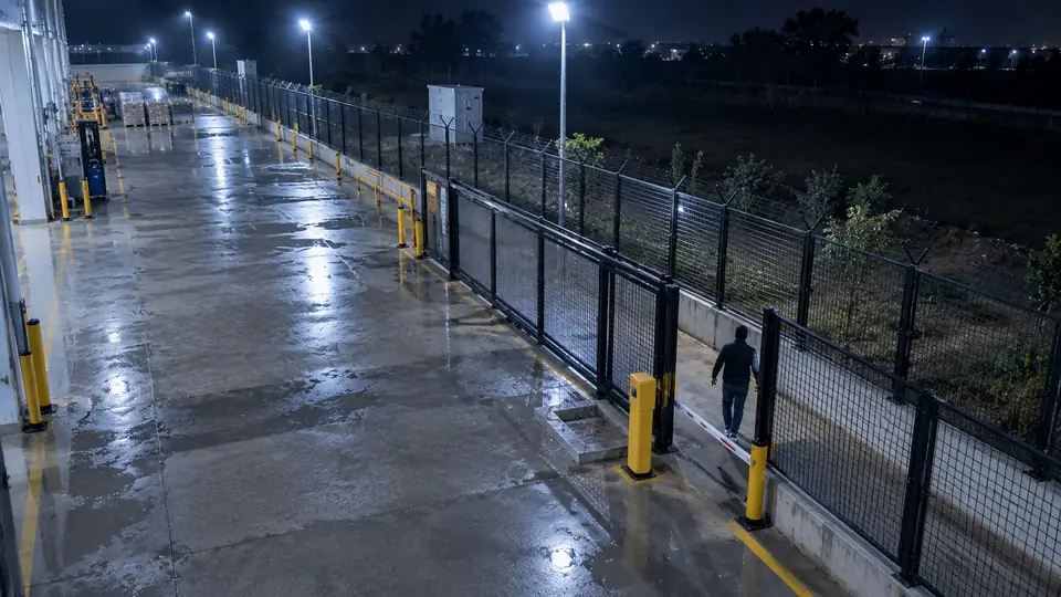 Example: perimeter intrusion detection, a person at the fence gate at night.